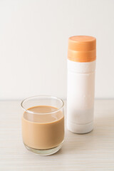 coffee latte glass with ready to drink coffee bottles