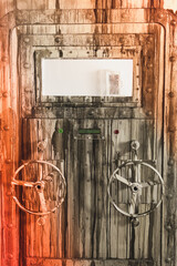 Image of locked grey door of lab in lost room.