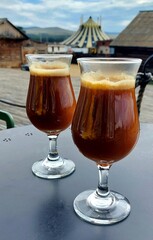 Coffee drink in two glassed.Invigorating,fragrant coffee.Grond coffee,coffee beans,turkish coffee.Coffee together.Coffee cocktail