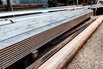  Stacks of metal on the warehouse . Business and metallurgical production - obrazy, fototapety, plakaty
