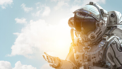 Astronaut against cloudy sky background