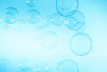 Beautiful Transparent Blue Soap Bubbles on White Background