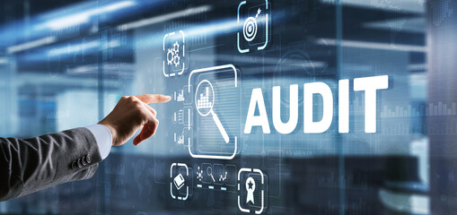 Audit. Checking the financial statements of the company. Businessman touching Audit on 3d virtual...