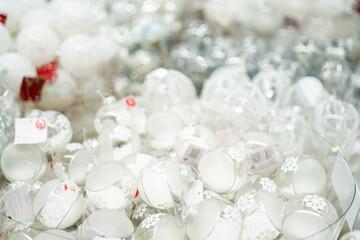 Holiday decorations for the Christmas tree. Blurred holiday background.