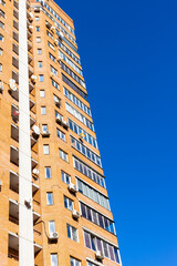 high-rise apartment building and blue sky