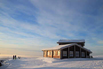 The ski resort. The house for the holidays. Snowboarder and skier