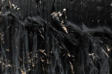 creative dark background. oil production concept. crude oil close up