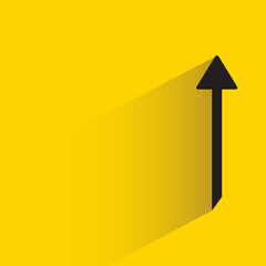 arrow with shadow on yellow background