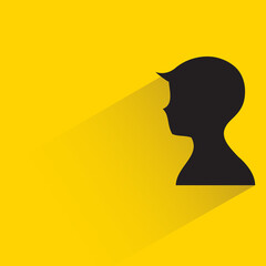 silhouette male face with drop shadow on yellow background