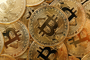 Fototapeta na wymiar Close up shot of Bitcoin coins on black background, A pile of Bitcoin Cryptocurrency Gold Bitcoin BTC Bit Coin. Digital blockchain technology, bitcoin mining concept