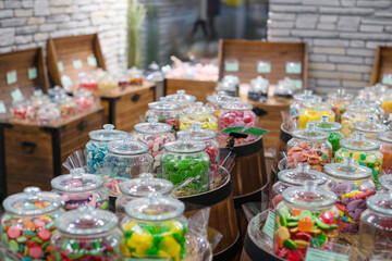 Delicious, sweet jelly-chewing colored candies in the assortment of the store. Delicious sweets.
