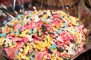 Delicious, sweet jelly-chewing colored candies in the assortment of the store. Delicious sweets.