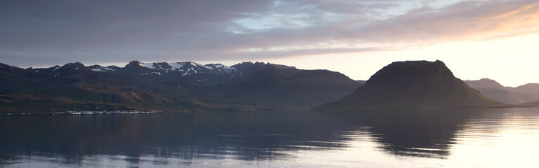 Kirkjufell mountain as seen from the fjord