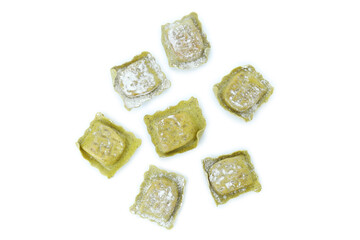 Tasty raw ravioli isolated on white background