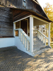 white porch of a wooden house