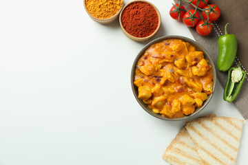 Concept of tasty food with chicken tikka on white background