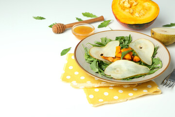 Concept of tasty food with pumpkin salad on white background