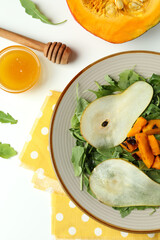 Concept of tasty food with pumpkin salad on white background