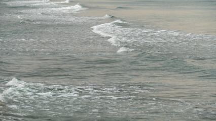 waves crashing on the beach, waves breaking on the beach