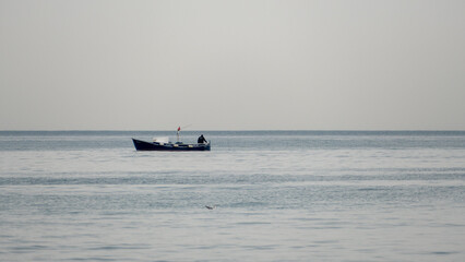 Obraz premium fishing boat in the sea, a fishing boat wallpaper, fishing in the sea