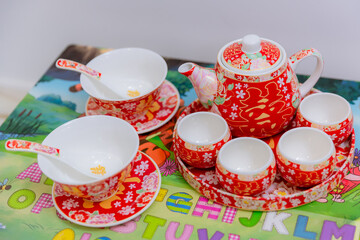 Tea set used in a Chinese wedding tea ceremony. Chinese wedding tea ceremony serving to elders. The...