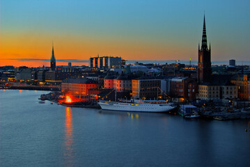 Fototapeta premium Valpurgie's night in Stockholm City. Sunset view on gamla stan 