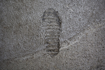 footprint in the concrete background 