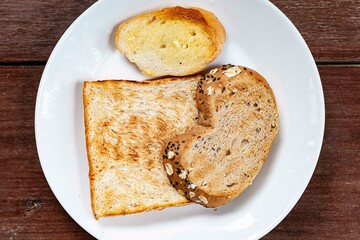 Breakfast plate, toast and jam with butter