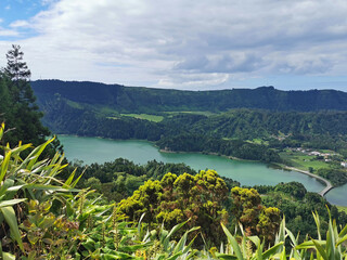 green and blue lake in cidade on the azores islands