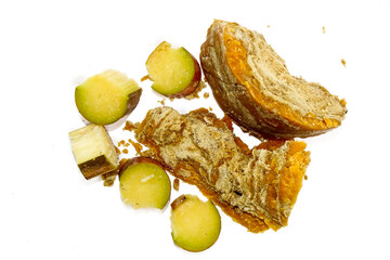 A block of Indian Jaggery organic isolated on white background.