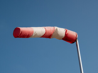 Windsock red and white for indicating the wind direction