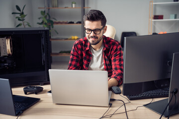 Portrait of attractive skilled cheery focused guy typing writing e-mail html css c code security...