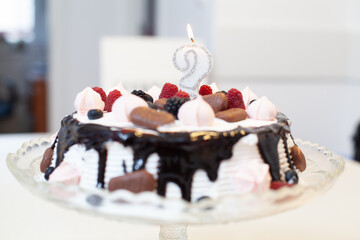 Birthday cake. Tasty dessert with fruit and chocolate. Homemade prepare.