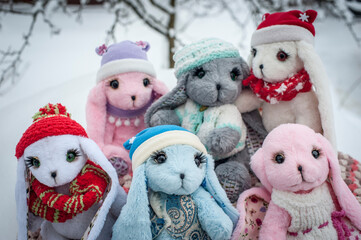 soft toy hare on the background of snow