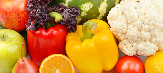 Set of various vegetables and fruit . Colorful background. Wide photo.