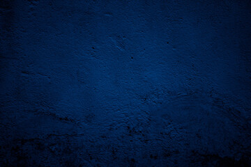 fond ou texture abstraite de mur de béton bleu nuit