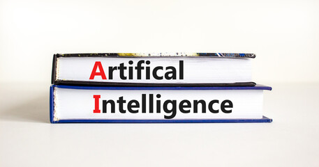 AI artificial intelligence symbol. Concept words 'AI artificial intelligence' on books on a beautiful white table, white background. Business, AI artificial intelligence concept, copy space.