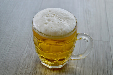 A Dutch lager in a glass on the table