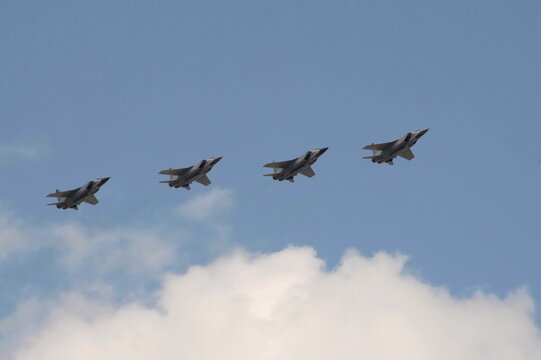 Upgraded MiG-31K interceptor fighters with a hypersonic Dagger missile on the hull in the sky over Moscow's Red Square during the dress rehearsal of the Victory Parade