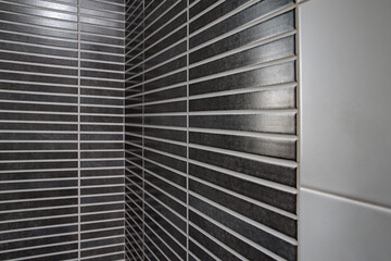 Black ceramic tiles in the bathroom