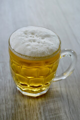 A Dutch lager in a glass on the table