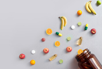 Assorted fruits multivitamins concept