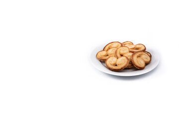 Palmier puff pastry in plate isolated on white background