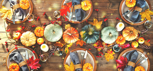 Autumnal decorated table for celebrating Thanksgiving or other family celebration