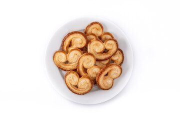 Palmier puff pastry in plate isolated on white background