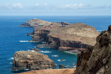 Obraz premium Ilhéu da Cevada, Madeira, view over rocks and sea with cloudy sky