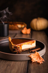 Piece of sweet pumpkin cheesecake with spices