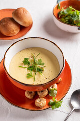 Mushroom cream soup with greens for dinner
