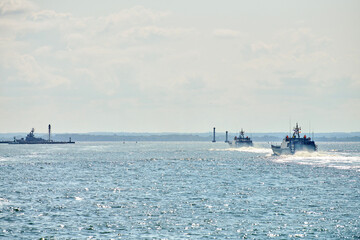 Coastguard, rescue support patrol boats for defense, military ships in blue sea, Russian Navy