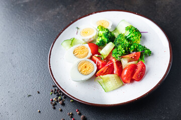 buddha bowl fresh salad boiled egg, broccoli, tomato, cucumber, vegetables meal snack on the table copy space food background rustic keto or paleo diet veggie vegan or vegetarian food no meat